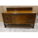 Early 20th century oak Sideboard with two central drawers and two cupboards, 182cm by 62cm by 116cm