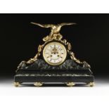 A VINCIENTI & CIE VERDE ANTICO AND NOIR BELGE GILT BRONZE MOUNTED MANTEL CLOCK WITH EXPOSED