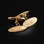 A PAIR OF ART NOUVEAU DIAMOND AND YELLOW GOLD OVAL CUFFLINKS, the custom designed elongated oval