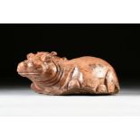 A CARVED TEAK BABY HIPPOPOTAMUS, MID/LATE 20TH CENTURY, a naturalistic carving of a partially