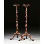 A PAIR OF GEORGE III (1760-1820) TALL WALNUT CANDLE STANDS, EARLY 19TH CENTURY, the dished