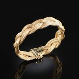 AN 18K YELLOW GOLD GUCCI BRACELET, the double rope braided design with hidden push button box