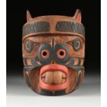 HARRY HUNT (Kwakiutl 1923-1985) AN INDIGENOUS MASK CARVING, "Beaver," 1981, black and red painted