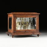 A LATE VICTORIAN CARVED WALNUT AND BEVELED GLASS TANTALUS, LATE 19TH/EARLY 20TH CENTURY, the box