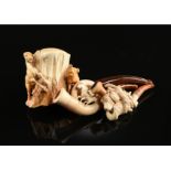 A GROUP OF FOUR MEERSCHAUM PIPES, LATE 19TH/EARLY 20TH CENTURY, comprised of an owl, a hound and