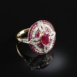A BELLE Ã‰POQUE 18K YELLOW AND WHITE GOLD, DIAMOND, AND RUBY RING, FRENCH, CIRCA 1910, a central