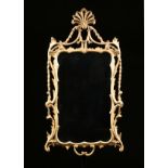 AN ITALIAN ROCOCO STYLE GILTWOOD MIRROR, MID 19TH CENTURY, the pierced plume on a scrolled vegetal