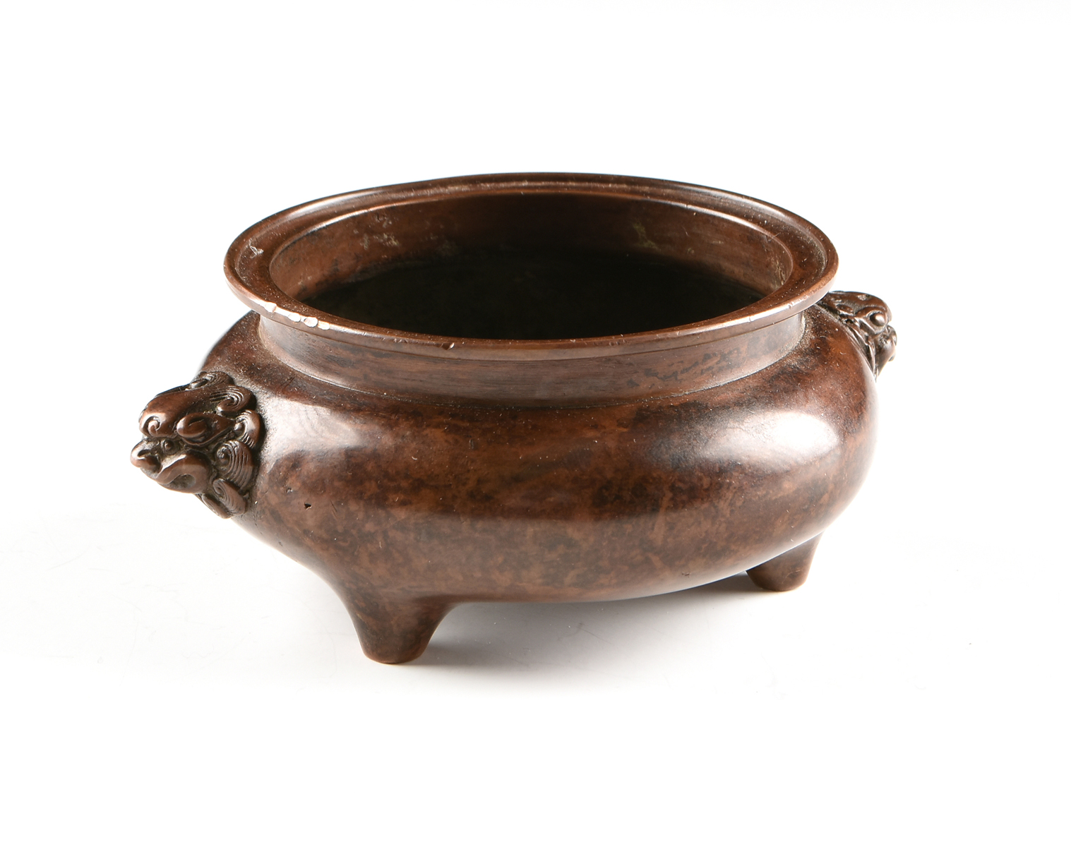 A CHINESE ARCHAISTIC STYLE COPPERED BRONZE TRIPOD CENSER, 19TH/20TH CENTURY, the dished mouth over a