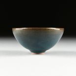 A CHINESE JUNYAO BOWL, IN THE YUAN DYNASTY (1279-1368) STYLE, the cream and dark brown rim with a