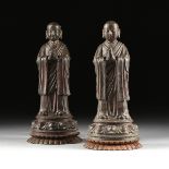 A PAIR OF MING DYNASTY STYLE ENAMELED BRONZE DISCIPLES OF BUDDHA, 17TH/18TH CENTURY, enameled bronze