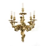 A LOUIS XV STYLE GILT BRONZE FIVE LIGHT WALL SCONCE, LATE 20TH CENTURY, with an undulating scrolling