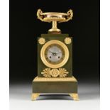 A RESTAURATION GILT AND GREEN PATINATED BRONZE MANTLE CLOCK, 1820s, the stepped rectangular case