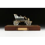 A FORD 75th ANNIVERSARY STERLING SILVER AND GOLD 1903 MODEL A FORD, BY AMERICAN SILVERSMITHS