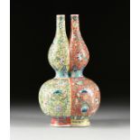 A QING DYNASTY STYLE CONJOINED BURNT ORANGE AND YELLOW GROUND ENAMELED PORCELAIN DOUBLE GOURD