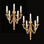 A PAIR OF LOUIS XVI STYLE GILT BRONZE FIVE LIGHT WALL SCONCES, 20TH CENTURY, each backplate cast