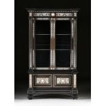 A NORTH ITALIAN MARQUETRY INLAID EBONIZED VITRINE CABINET, 1870-1900, in the Renaissance taste,