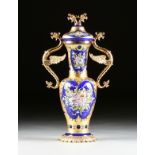 A MURANO COBALT GLASS 24K PARCEL GILT ENAMELED METAL MOUNTED LIDDED URN, ITALY, 20TH CENTURY, the