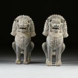 A PAIR OF THAI STYLE BRONZE GUARDIAN LIONS, 20TH CENTURY, seated and forward facing with elaborate
