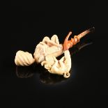 A PAIR OF TWO EROTIC MEERSCHAUM PIPES, LATE 19TH/EARLY 20TH CENTURY, carved in the form of a