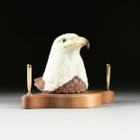 A BOEHM SCULPTURE, "Bald Eagle Head," UNITED STATES, mounted to a mahogany dual pen holder, the