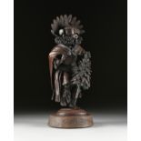 LOWELL TALASHOMA, SR (Hopi 1950-2003) A BRONZE SCULPTURE, "Talavai-The Morning Kachina," 1982,