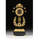 LOUIS PHILIPPE GILT BRONZE MOUNTED EBONY LYRE FORM MANTLE CLOCK, BY GILLION, PARIS, 1830-1848, the