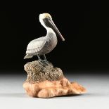 LIA RAHM (American 20th Century) A WOOD SCULPTURE, "Brown Pelican," 1984, the painted wood sculpture