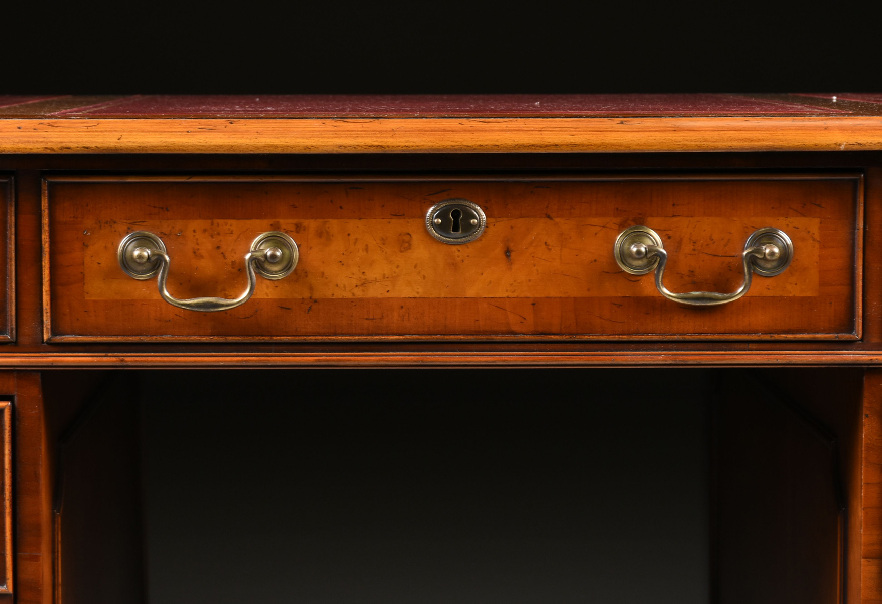 A GEORGE II STYLE WALNUT BURGUNDY LEATHER TOP PARTNER'S DESK, ENGLISH, MID 20TH CENTURY, modeled - Image 3 of 15