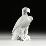 A LALIQUE CRYSTAL"LIBERTY" EAGLE, SIGNED, LATE 20TH CENTURY, modeled with a fierce expression in a