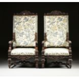 A PAIR OF ITALIAN BAROQUE REVIVAL UPHOLSTERED AND CARVED WALNUT THRONE ARMCHAIRS, LATE 19TH CENTURY,