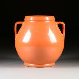 AN ITALIAN MID CENTURY MODERN ORANGE GLAZED AMPHORA VASE, RUFFO GIUNTINI (1899-1980), CIRCA 1960,