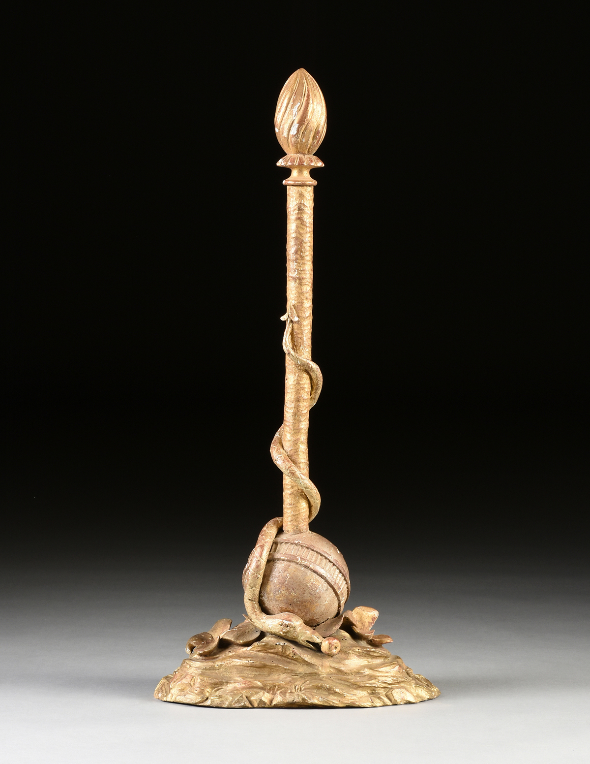 AN ITALIAN PARCEL GILT CARVED WOOD SERPENT ENTWINED ROD SCULPTURE, 19TH CENTURY, the sinuous long