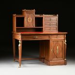 AN EMPIRE REVIVAL STYLE GILT BRONZE MOUNTED MAHOGANY DESK, MODERN, with a rectangular gilt tooled