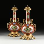 A PAIR OF SEVRES NEO-GREC STYLE GILT BRONZE MOUNTED SANG DE BOEUF PORCELAIN VASES, FRENCH, CIRCA