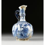 A CHINESE BLUE AND WHITE PORCELAIN EWER, SHIPWRECK ARTIFACT, ARTEMIS LEAF MARK, KANGXI PERIOD (