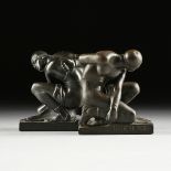 A PAIR OF ART DECO PATINATED COPPER CLAD FIGURAL BOOKENDS, "The Slave," BY THE POMPEIAN BRONZE CO,