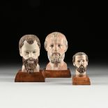 A GROUP OF THREE SANTOS' HEADS, LATE 19TH/EARLY 20TH CENTURY, hand painted wood fragments of holy