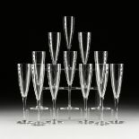 A SET OF TWELVE BACCARAT "DOM PERIGNON" CRYSTAL CHAMPAGNE FLUTES, MODERN, clear blown five-ounce