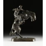 FREDERIC REMINGTON (American 1861-1909) A BRONZE SCULPTURE, "Bronco Buster," with dark brown