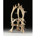 AN ANTIQUE ELK ANTLER DISPLAY STAND, SCOTTISH, CIRCA 1875, composed of shed antlers in a pyramidal