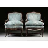 A PAIR OF LOUIS XV STYLE CARVED WALNUT FAUTEUILS A LA REINE, 20TH CENTURY, each with a serpentine