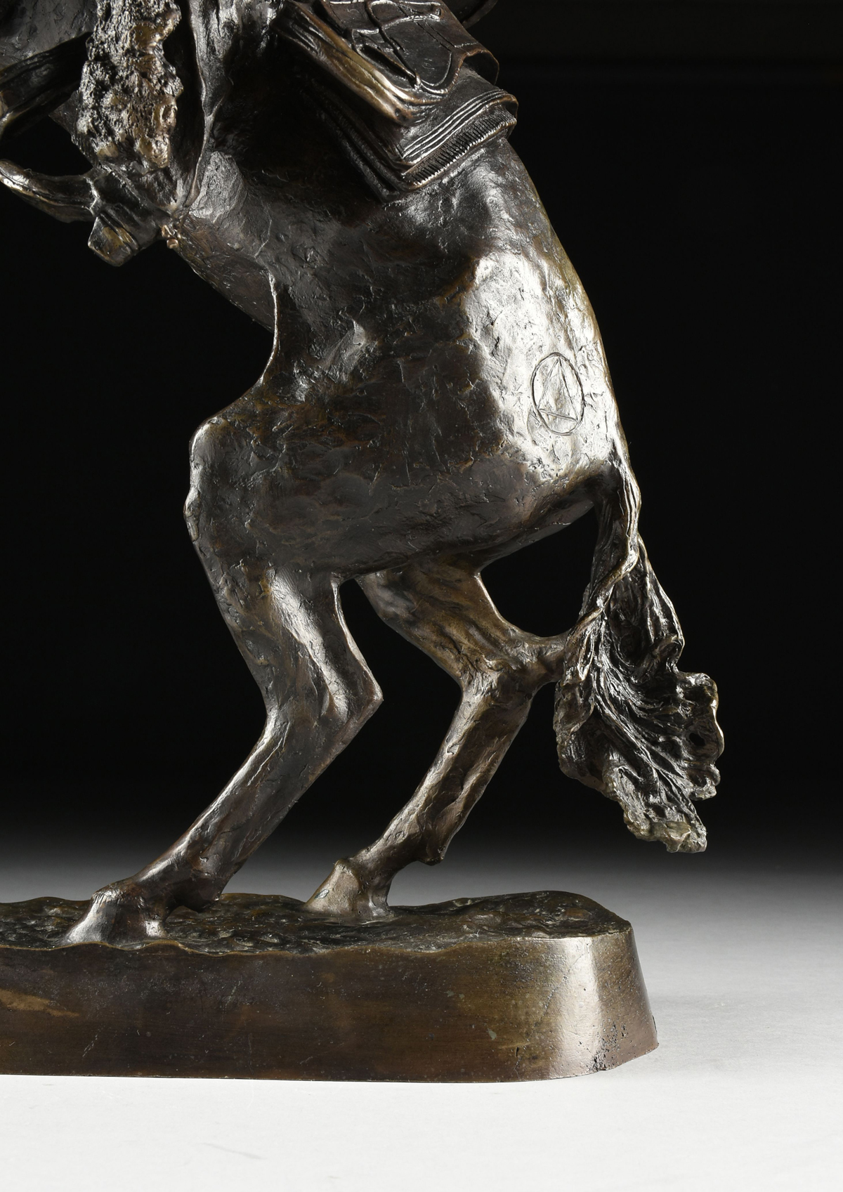 FREDERIC REMINGTON (American 1861-1909) A BRONZE SCULPTURE, "Bronco Buster," with dark brown - Image 11 of 16