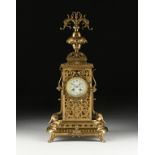 A RENAISSANCE REVIVAL GILT BRONZE MANTLE CLOCK, FRENCH, LATE 19TH CENTURY, the finial cast as