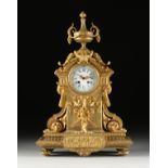 A LOUIS XVI REVIVAL GILT BRONZE MANTLE CLOCK, THIRD QUARTER 19TH CENTURY, the circular bronze beaded