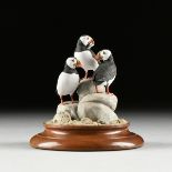 MANFRED K. SCHEEL (American 20th Century) A SCULPTURE, "Atlantic Puffins," 1989, painted wood on