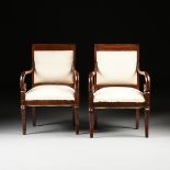 A SET OF FOUR LOUIS PHILIPPE CARVED MAHOGANY FAUTEUILS, 1830s, each with flat rounded sides