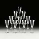 A SET OF TEN BACCARAT CRYSTAL CHAMPAGNE FLUTES, PATTERN 100-192, MODERN, the conical bowl on an
