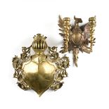 A GROUP OF TWO CONTINENTAL POLISHED BRASS AND BRONZE ARMORIAL WALL MOUNTS, LATE 19TH/EARLY 20TH