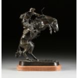 after FREDERIC REMINGTON (American 1861-1909) A BRONZE SCULPTURE, "Bronco Buster," with a nice