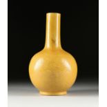 A QING DYNASTY STYLE EGG YOLK YELLOW INCISED BOTTLE VASE, EARLY 20TH CENTURY, the long slightly